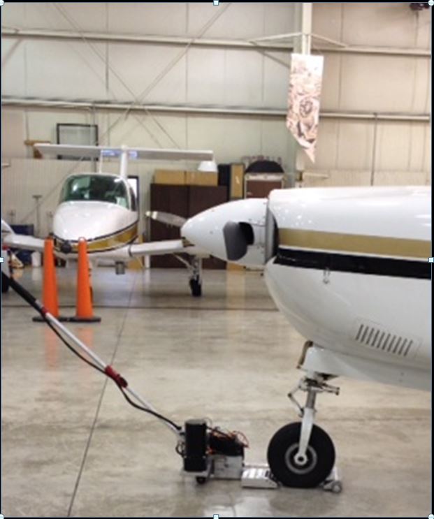Purdue-ME-Project_portable electric towbar_pulling plane_12-11-2013a